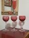 3 Elegant Beautiful cut to clear cranberry wine glasses. Possibly Bohemian MINT