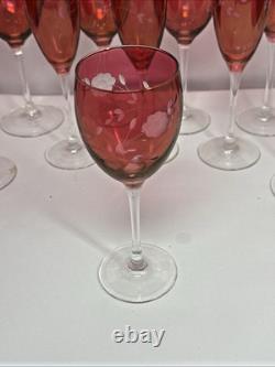 Entire Set Of Vintage Cranberry Floral Etched wine water glasses. Marked French