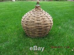 Large Oval Wicker wrapped Green Glass Demijohn vintage 46 inch circumfrance