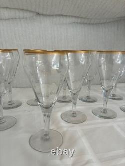 Set of 12 crystal wine glasses with gold rim