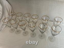 Set of 12 crystal wine glasses with gold rim