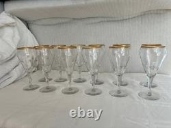 Set of 12 crystal wine glasses with gold rim