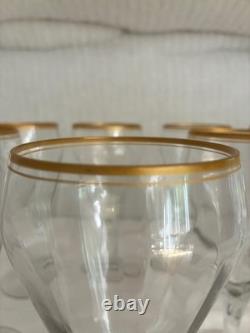 Set of 12 crystal wine glasses with gold rim