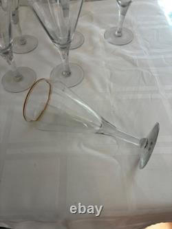 Set of 12 crystal wine glasses with gold rim