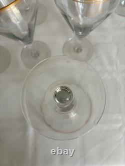Set of 12 crystal wine glasses with gold rim