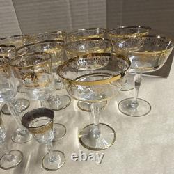 Vintage bohemian crystal wine glasses featuring 22 k gold etching